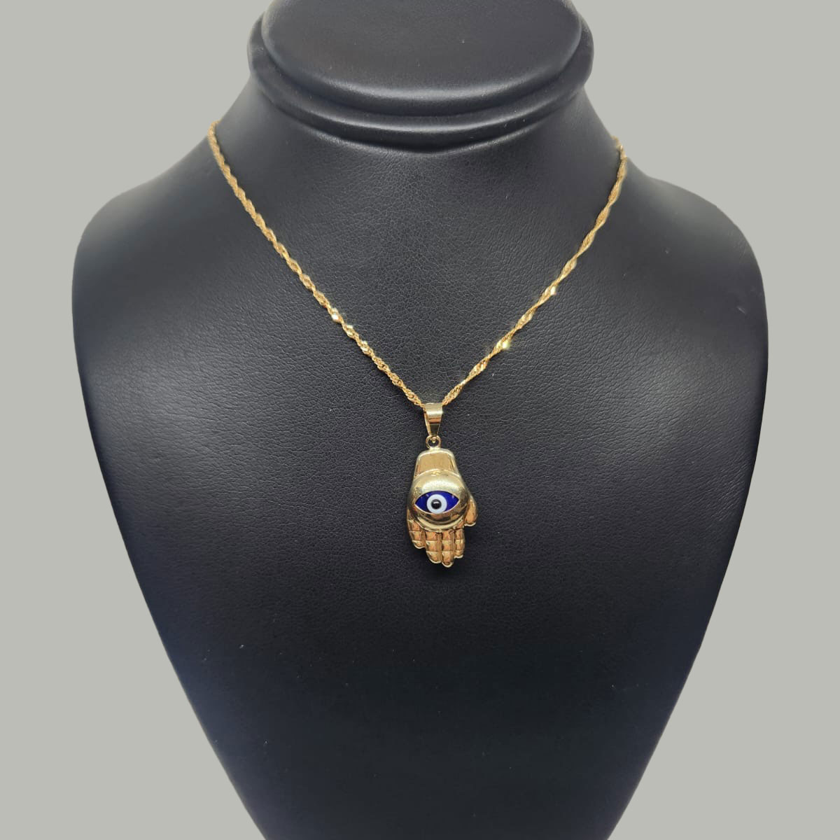 Gold Hamsa Hand Pendant Necklace with Evil Eye Design